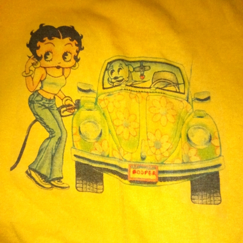 Bright yellow VTG Betty Boop 60's T-shirt with Pudgy in passenger seat pump gas